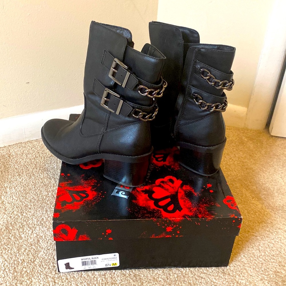 Biker inspired, chain adorned, small heeled, ankle boots